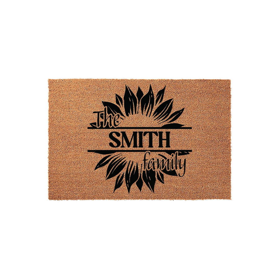 Personalized Sunflower Family Name Doormat featuring a natural coir texture with a bold black sunflower graphic and custom text space for a family name, creating a welcoming entryway decor piece for any home front porch or