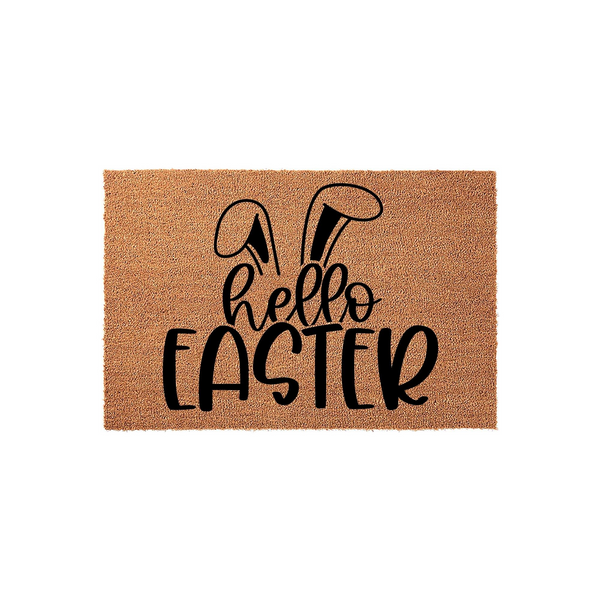 Hello Easter coir doormat featuring a natural brown fiber texture and black printed text with cute bunny ears, creating a festive spring entryway decor piece that welcomes guests to your home during the holiday season.