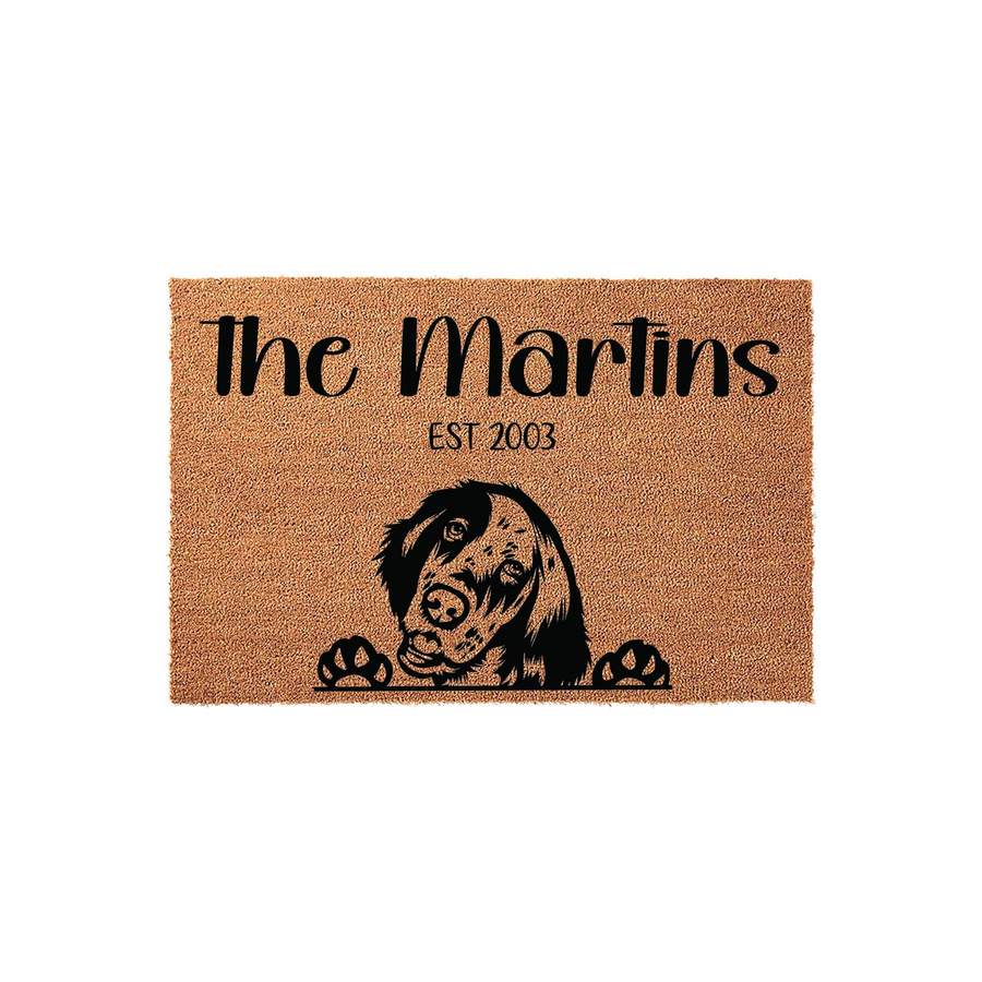 Personalized English Setter dog doormat featuring a cute illustrated dog peeking over its paws, customized with a family name and established year on a natural tan coir fiber background for a welcoming front porch entrance.