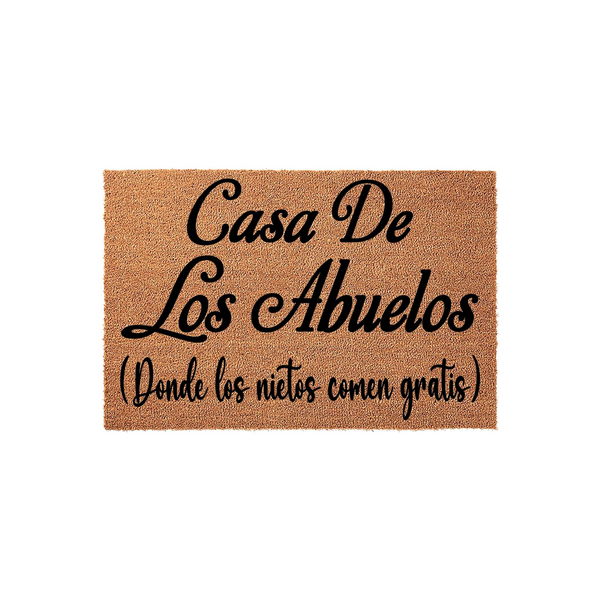 Abuelos Coir Doormat featuring the Spanish phrase Casa De Los Abuelos, where the grandchildren eat for free, printed in elegant black script on a natural brown textured coconut fiber mat against a clean white studio background.