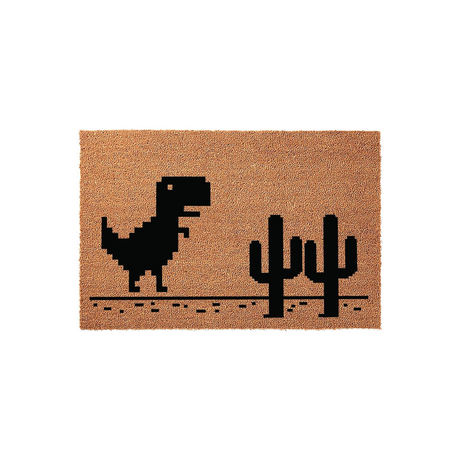 Pixel Art Dinosaur Doormat featuring a black 8-bit T-Rex and cactus design printed on a natural tan coir fiber mat, creating a fun gaming-inspired entrance rug for any home or office space that appreciates retro video game