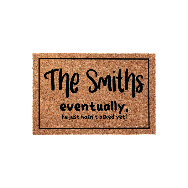 Personalized coir doormat featuring a humorous message about a family name, printed in bold black lettering on a natural tan fiber background with a simple rectangular border, perfect for a front porch or entryway home decor.