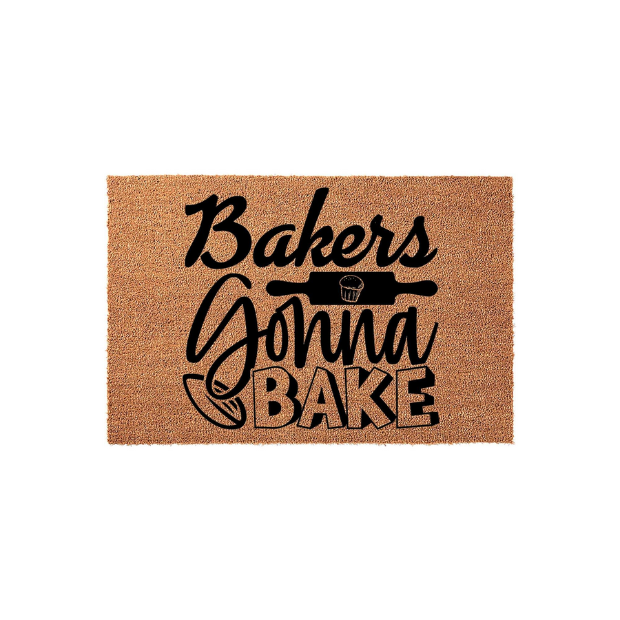Bakers Gonna Bake coir doormat featuring a natural tan fiber texture and bold black lettering, accented with a rolling pin and cupcake graphic, making it a fun kitchen decor addition for any home baker or cooking enthusiast.