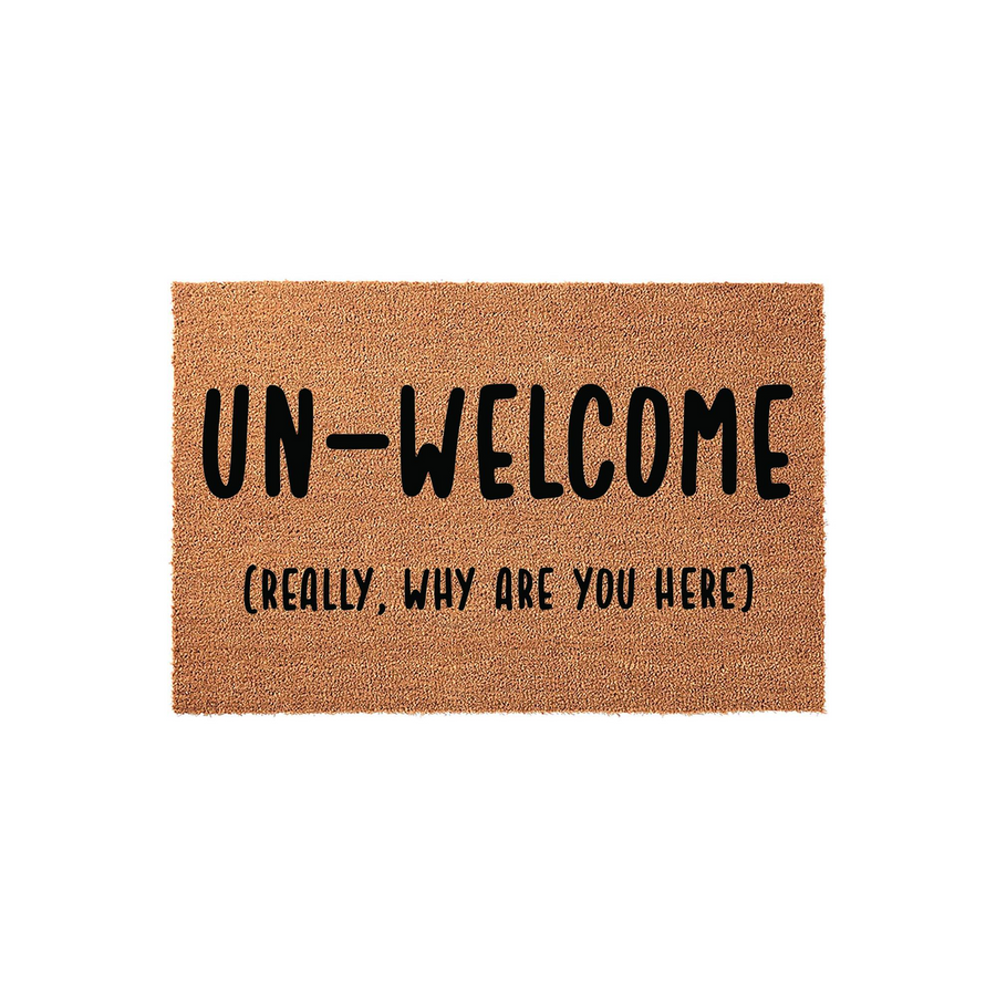 Funny Un-Welcome Coir Doormat featuring bold black text that reads Un-Welcome and Really, Why Are You Here, set against a natural brown fiber background for a humorous and sarcastic entryway decor statement for your front porch.