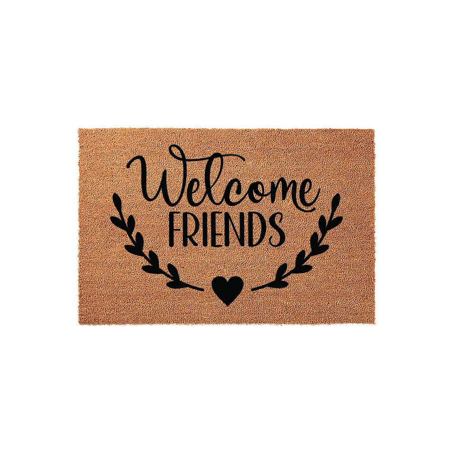 Welcome Friends coir doormat featuring a natural tan fiber texture and black printed text, accented by a decorative leafy branch wreath and a small heart icon centered at the bottom for a warm and inviting front porch entryway