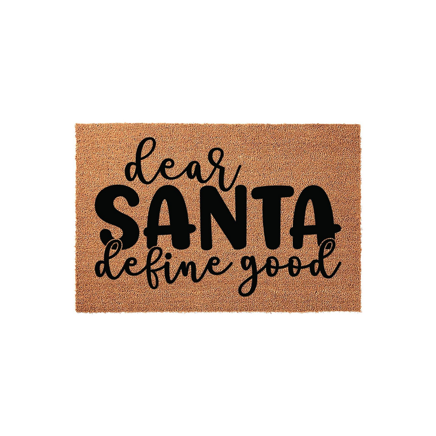 Dear Santa Define Good Christmas Doormat featuring a natural coir fiber texture with bold black lettering that adds a humorous and festive touch to your holiday home entryway decor during the winter season.
