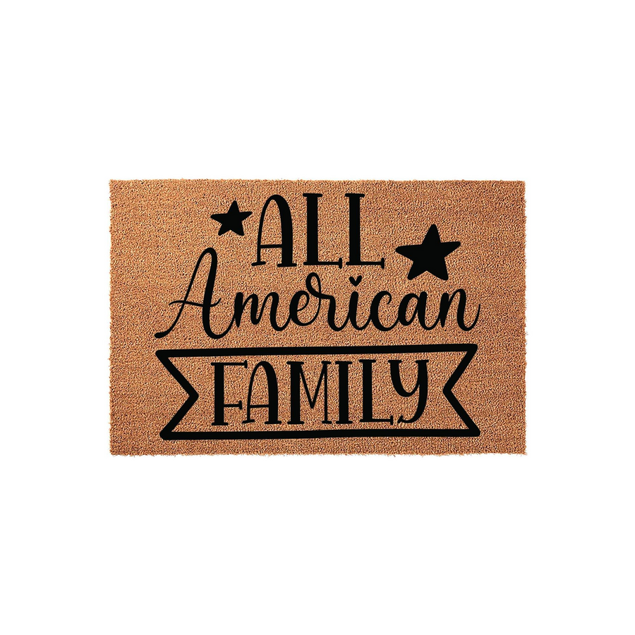 All American Family coir doormat featuring bold black typography and star accents on a natural tan fiber background, designed to add a patriotic and welcoming touch to your front porch entryway decor for any home entrance.