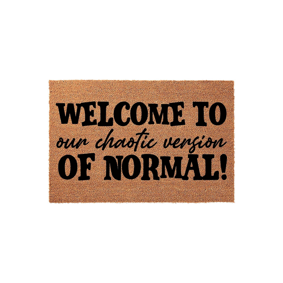 Funny Welcome To Our Chaotic Version Of Normal doormat featuring bold black text printed on a natural brown coir fiber mat, creating a humorous and inviting entryway decor piece for your home front porch or apartment door