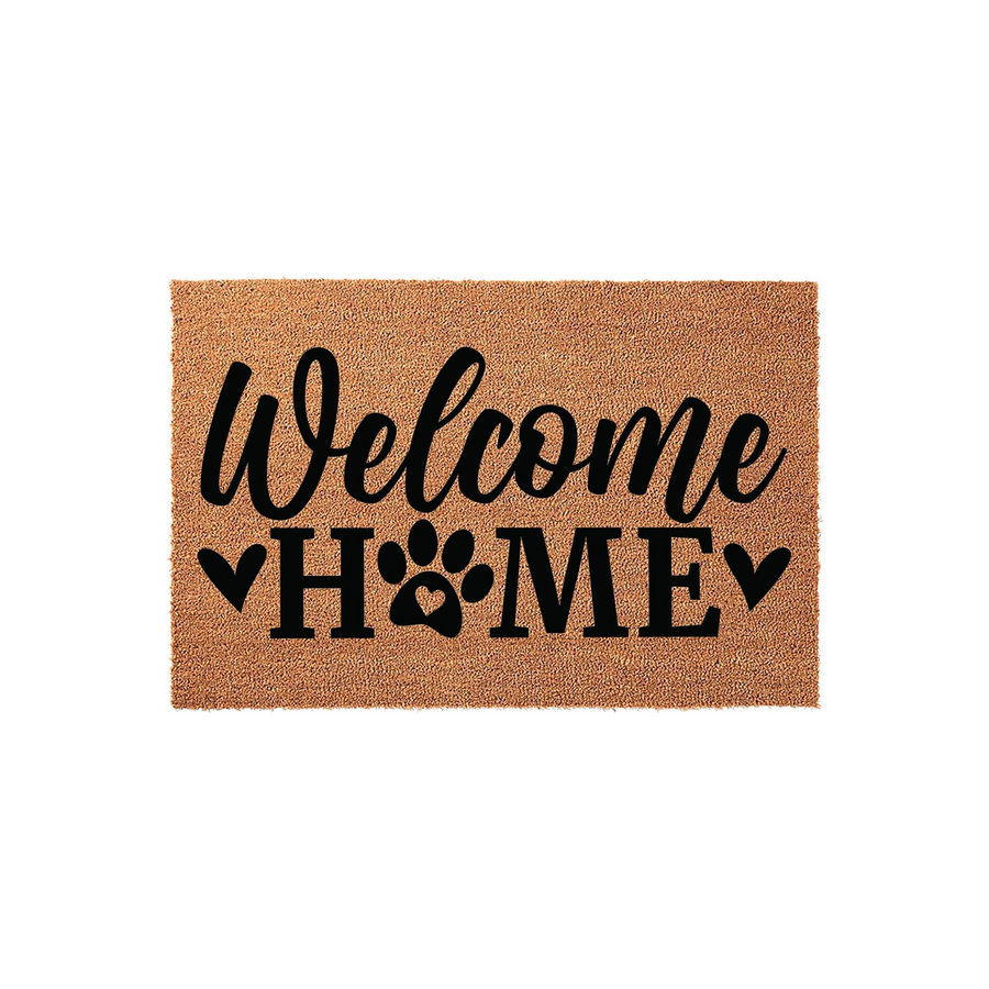 Welcome Home dog paw print coir doormat featuring a natural tan fiber texture with bold black lettering, where the letter O is replaced by a cute animal paw print design to celebrate your pet-friendly household entrance.