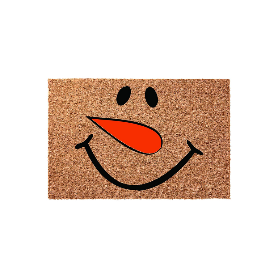 Snowman face holiday doormat featuring a cheerful printed design with black eyes, a wide smiling mouth, and a bright orange carrot nose on a natural tan coir fiber background, perfect for festive winter porch decor and entryway