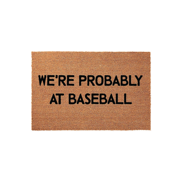 We're Probably At Baseball coir doormat featuring a natural tan fiber texture and bold black lettering, making it a fun front porch welcome mat for sports-loving families who spend their weekends at the local baseball field.