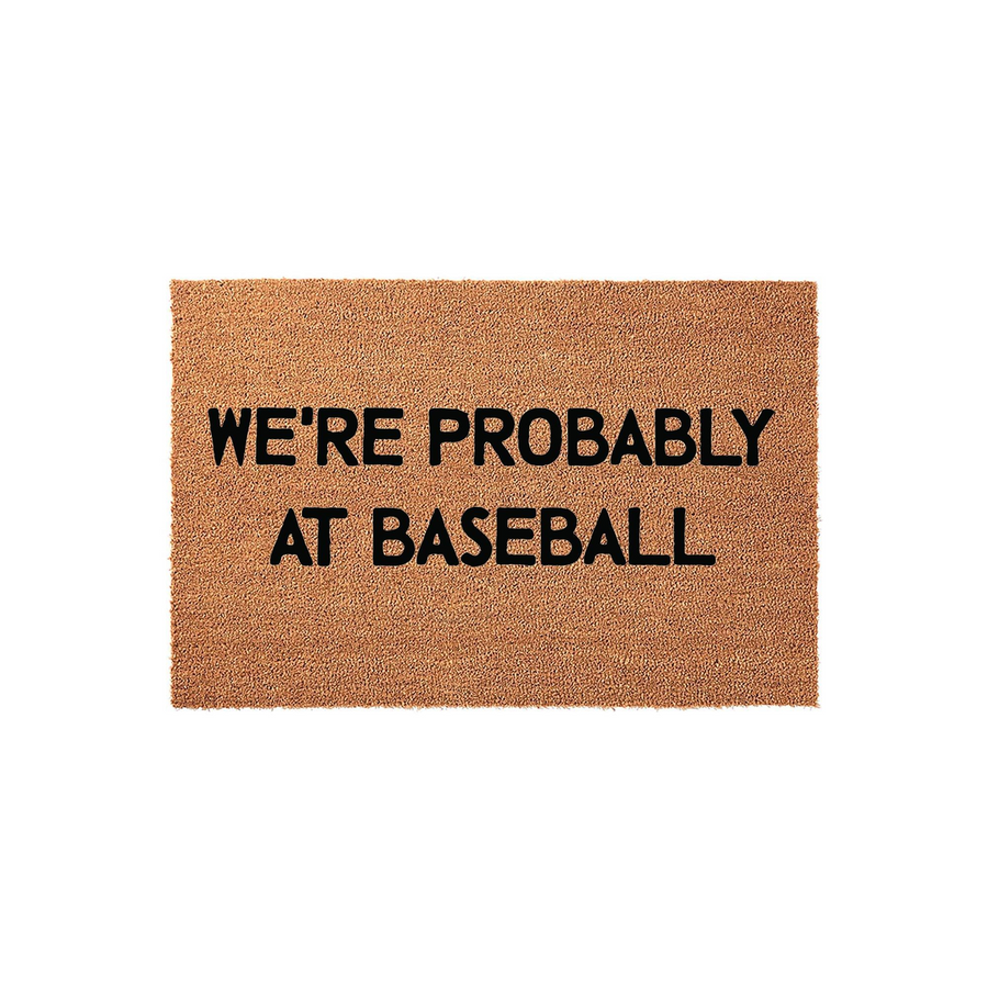 We're Probably At Baseball coir doormat featuring a natural tan fiber texture and bold black lettering, making it a fun front porch welcome mat for sports-loving families who spend their weekends at the local baseball field.