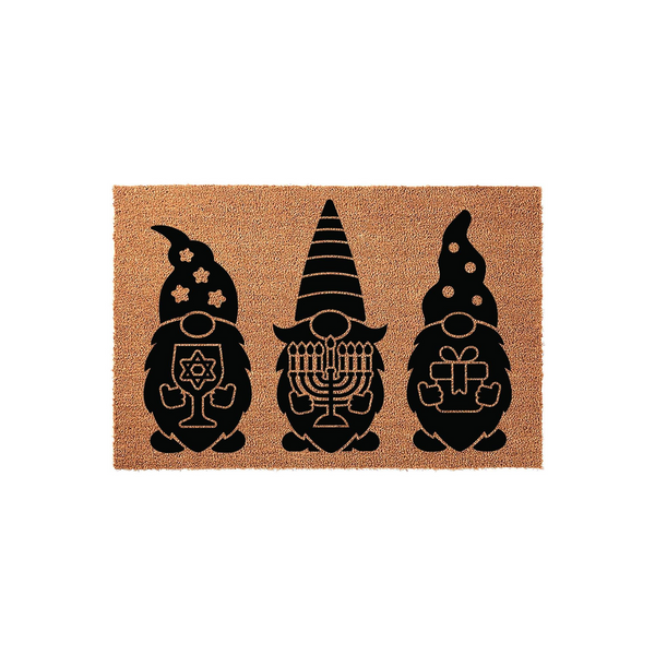 Hanukkah Gnome Coir Doormat featuring three black gnome silhouettes printed on a natural brown fiber background, with each gnome holding a different holiday icon including a Star of David, a menorah, and a wrapped gift for