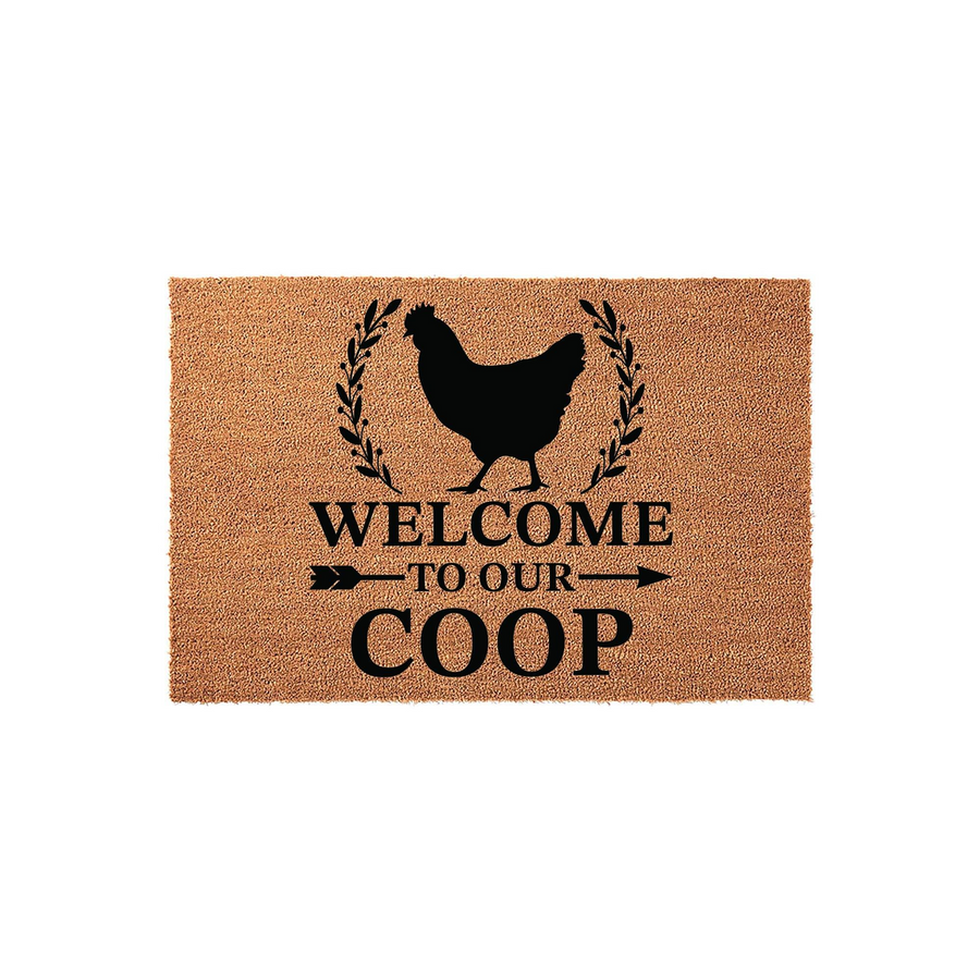 Farmhouse Chicken Welcome To Our Coop Doormat featuring a natural coir texture with a black silhouette of a hen framed by laurel branches, creating a rustic entryway accent for any backyard chicken keeper or farmhouse home decor
