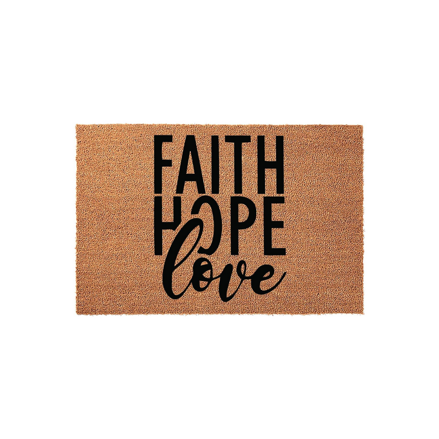 Faith Hope Love coir doormat featuring bold black typography printed on a natural brown coconut fiber mat, creating a welcoming and inspirational entryway decor piece for your front porch or home entrance on a clean white