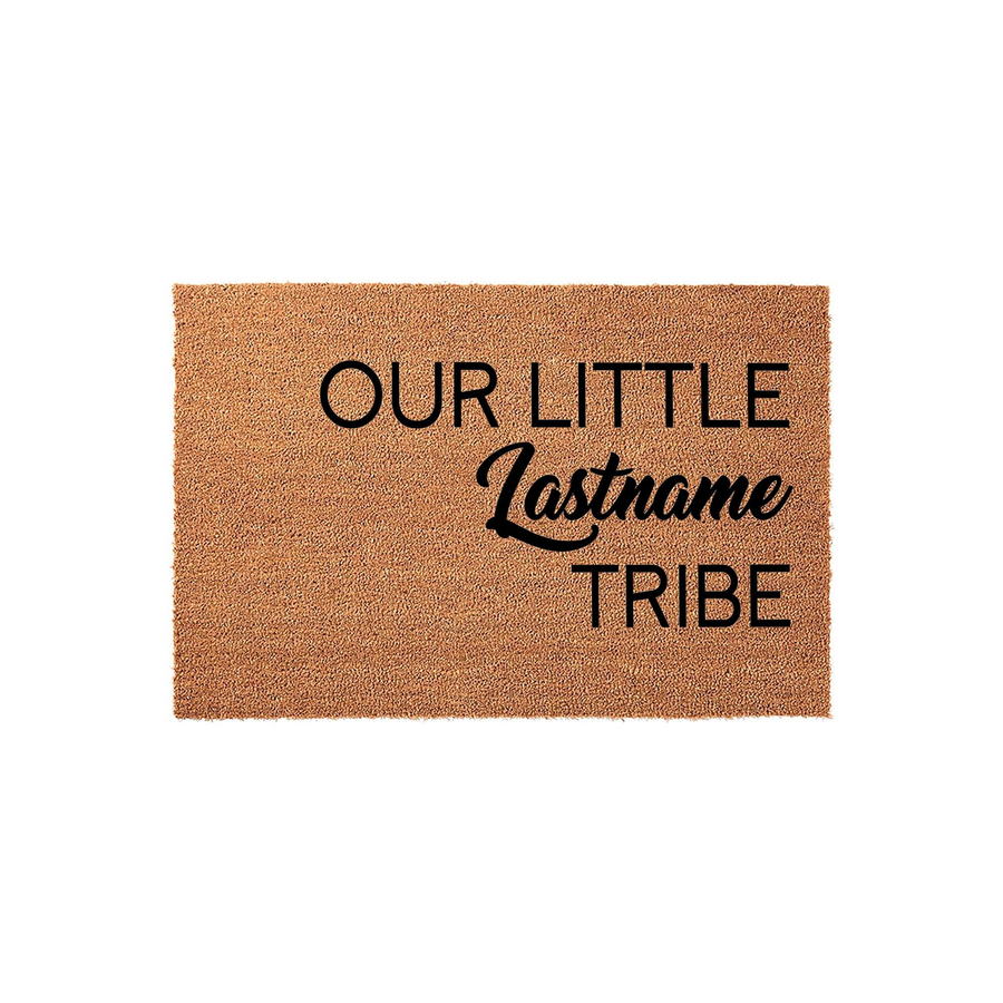 Personalized family name coir doormat featuring the phrase Our Little Lastname Tribe in bold black lettering, set against a natural tan textured fiber background for a welcoming and rustic front porch entrance decor style.