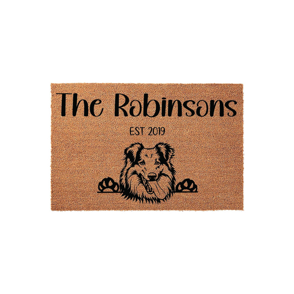 Personalized Collie Dog Doormat featuring a natural coir texture with a black printed illustration of a happy Collie dog peeking over the bottom edge, customized with a family name and an established year on a clean white