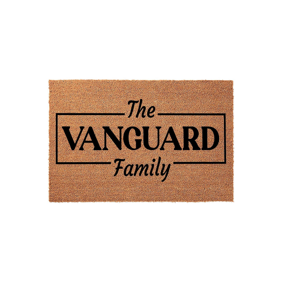 Personalized family name coir doormat featuring a rectangular border design with the text The Family centered in bold black lettering, providing a durable and welcoming entrance mat for any home front porch or entryway decor.