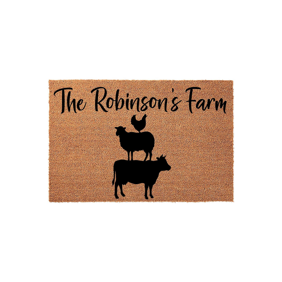 Personalized Farmhouse Coir Doormat featuring a stack of black silhouette animals including a cow, sheep, and chicken, with custom family name text printed above on a natural brown textured coir fiber background for a rustic
