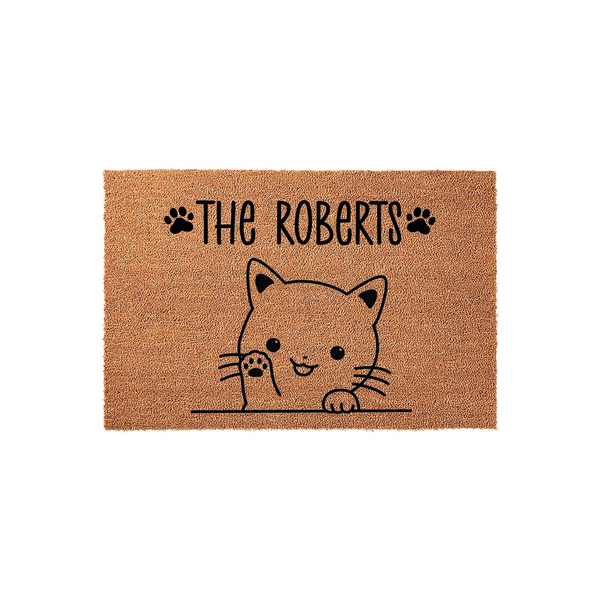 Personalized cat family doormat featuring a cute illustrated kitten peeking over a line with black paw prints and custom family name text on a natural coir fiber background, creating a welcoming entrance for any cat lover home.