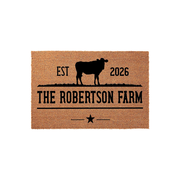 Personalized Farm Cow Doormat featuring a rustic coir texture with a black silhouette of a cow, the text EST 2026, and a decorative star accent, making a charming custom welcome mat for any farmhouse entryway or country home