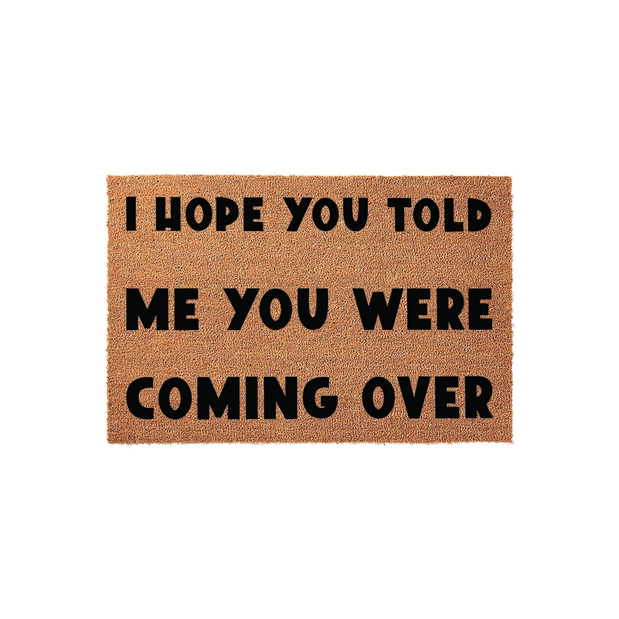 Funny I Hope You Told Me You Were Coming Over doormat featuring bold black text printed on a natural tan coir fiber mat, providing a humorous and welcoming touch to your front porch entryway decor for guests arriving at your home.