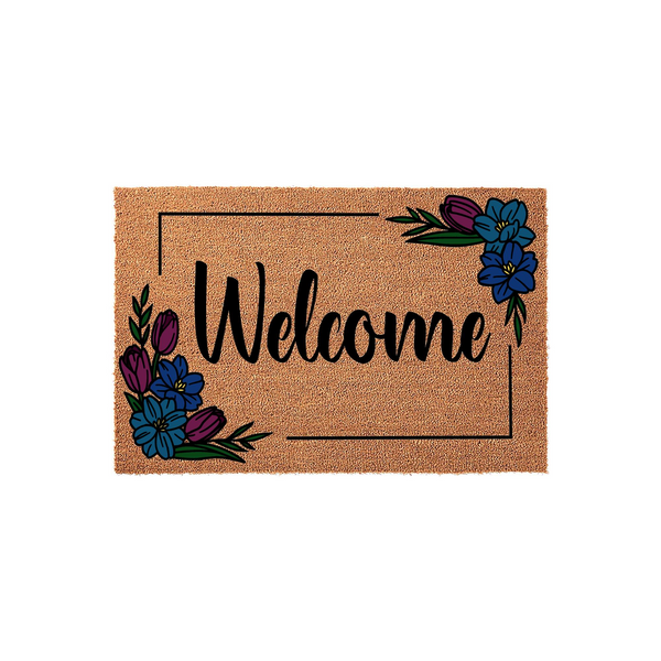 Floral Welcome Doormat featuring a natural coir texture with a black rectangular frame, elegant script lettering, and colorful blue and purple flower illustrations in the corners to create a welcoming entryway for your home decor.