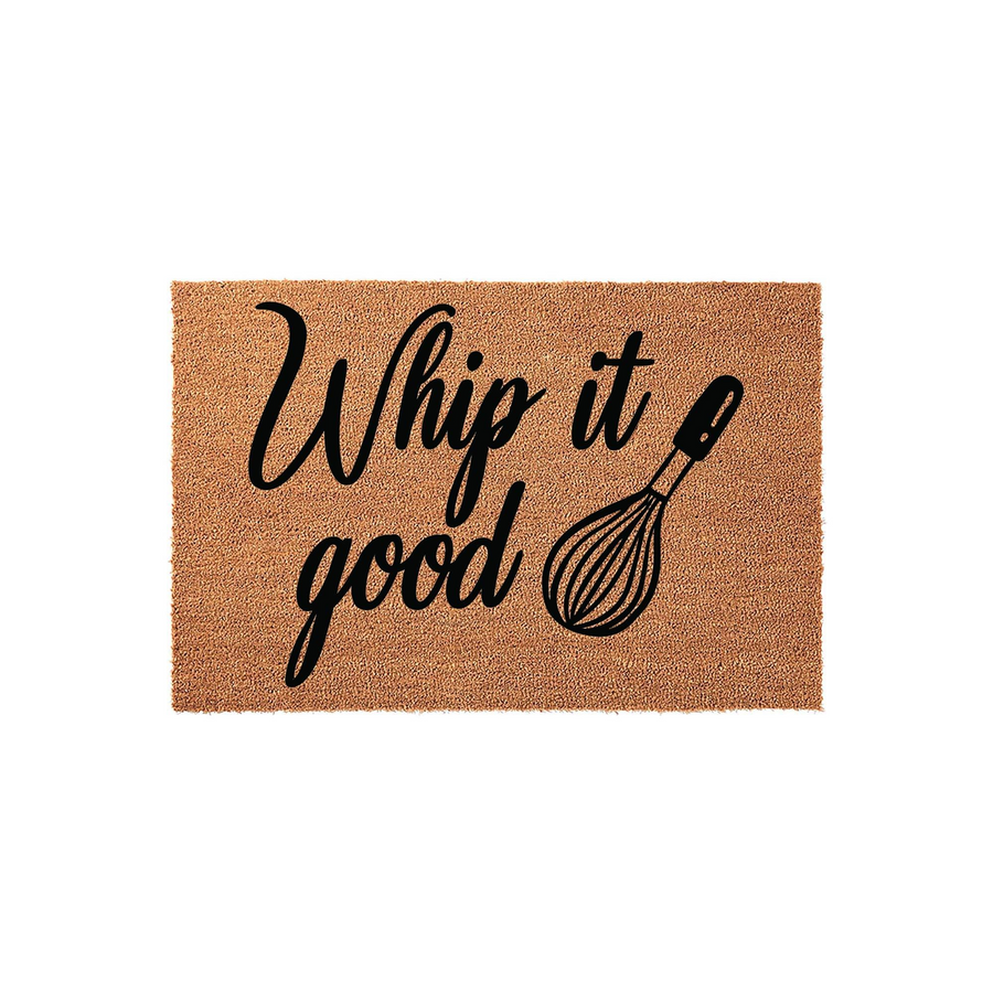 Whip It Good kitchen doormat made of natural coir fiber, featuring bold black script text and a whisk illustration centered on the rectangular mat, perfect for adding a fun and functional touch to any home cook's entryway or