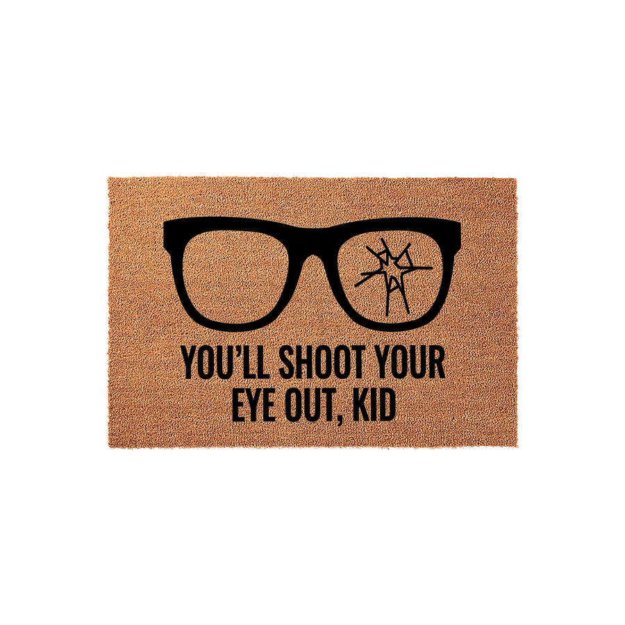 Funny Christmas Movie Quote Doormat featuring a graphic of black glasses with one cracked lens and the iconic text You'll Shoot Your Eye Out, Kid printed in bold black letters on a natural brown coir fiber welcome mat for your