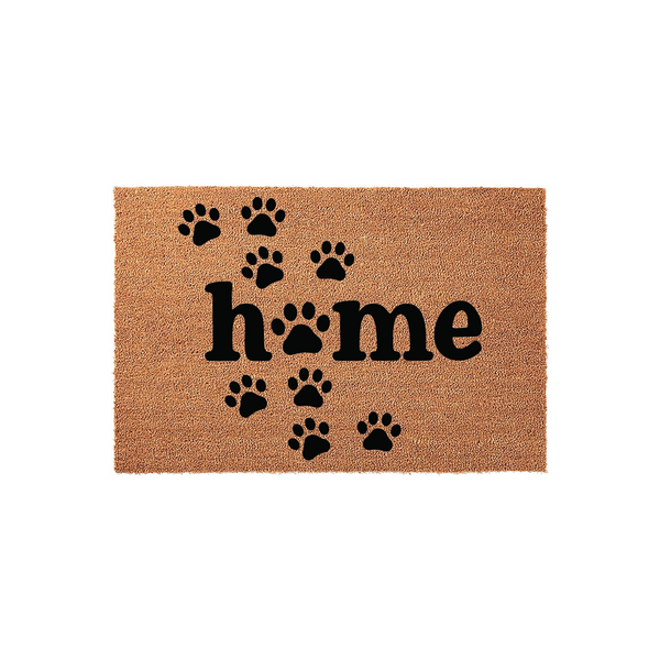 Dog Paw Print Home Doormat featuring a natural coir fiber texture with the word home printed in black, where the letter o is replaced by a paw print and surrounded by scattered black paw prints on a plain white background.