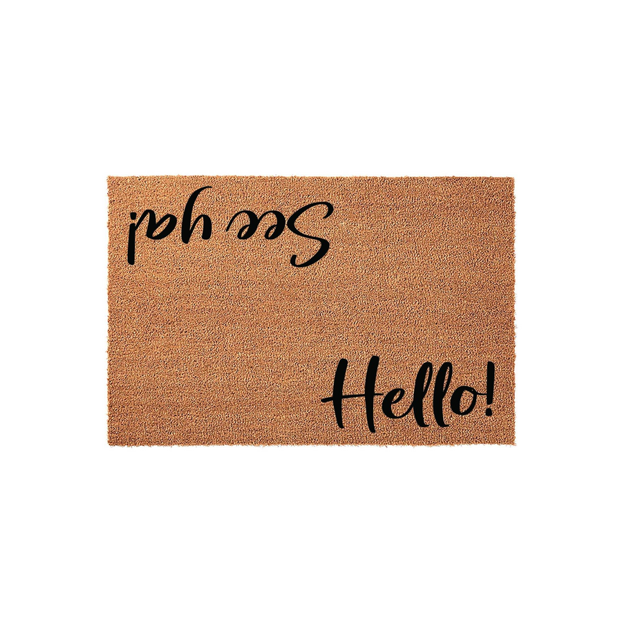 Hello See Ya Coir Doormat featuring a natural brown fiber texture with black script text that reads Hello on one side and See Ya on the other, designed to be readable from both inside and outside your home for a welcoming