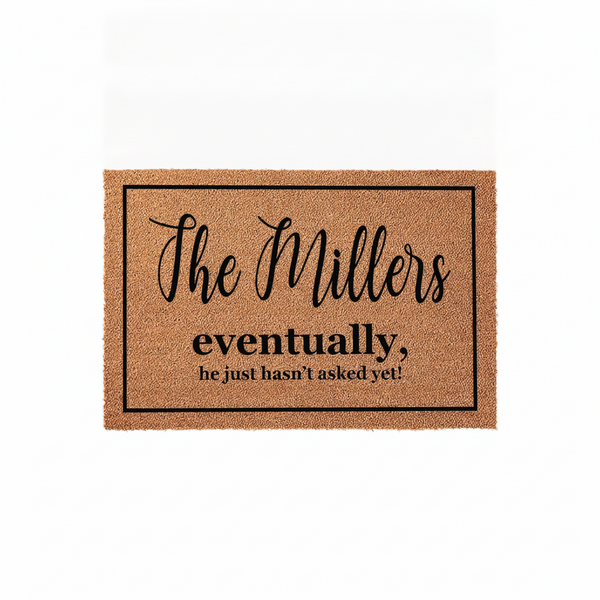 Personalized family name coir doormat featuring a humorous quote about marriage proposals, set against a clean white background to showcase the natural tan fiber texture and the bold black lettering of this custom home entrance