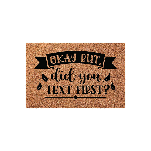 Funny Okay But Did You Text First Coir Doormat featuring bold black typography on a natural tan coconut fiber background, creating a humorous and welcoming entrance decor piece for any modern home front porch or entryway floor.