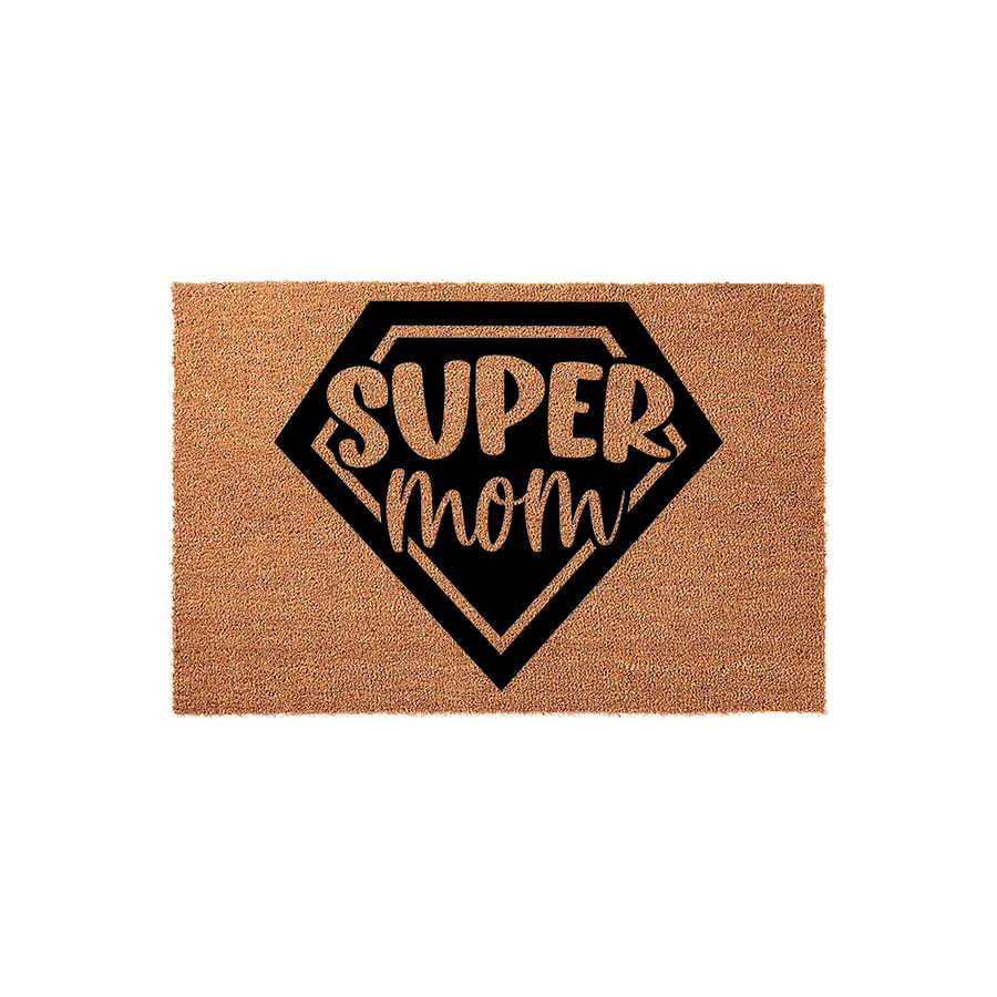 Super Mom coir doormat featuring a bold black superhero shield emblem printed on a natural brown coconut fiber mat, creating a fun and durable entryway decor piece that celebrates a special mom at the front door of any family