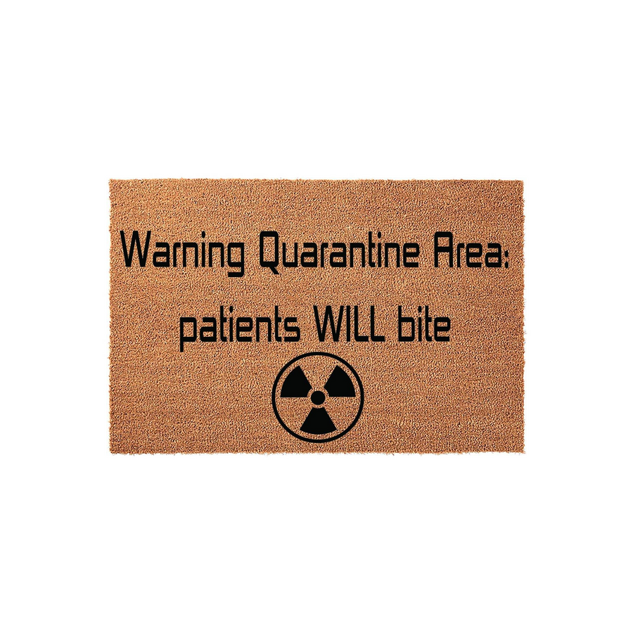 Funny Quarantine Area Doormat featuring a natural coir texture with black text that reads Warning Quarantine Area: patients WILL bite, accompanied by a bold radiation hazard symbol centered at the bottom on a clean white