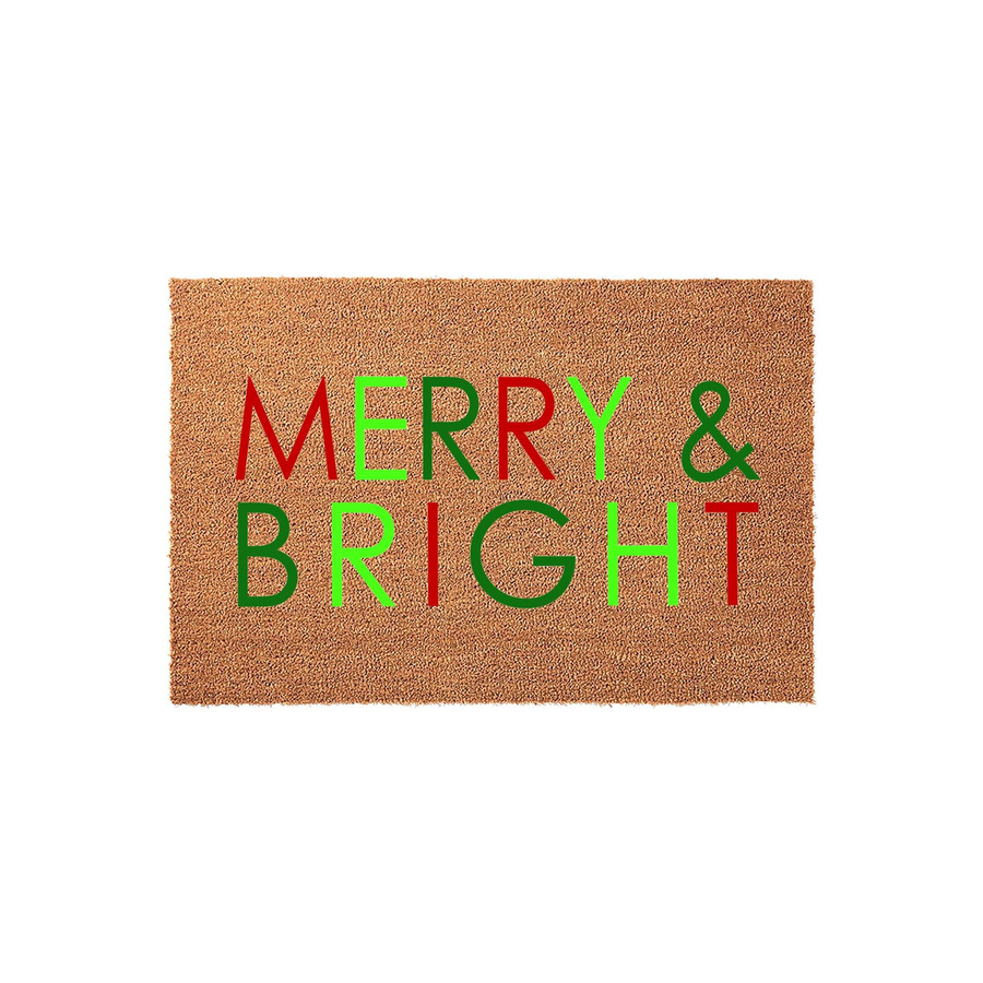 Merry and Bright Christmas doormat made of natural coir fiber, featuring festive red and green lettering centered on a rectangular mat against a clean white background for a classic holiday entryway decor look.