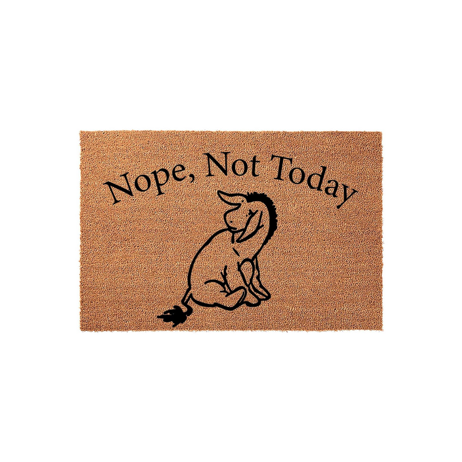 Nope, Not Today donkey doormat featuring a whimsical illustration of a sad donkey sitting on a natural coir fiber mat, with the humorous text printed in black ink against the textured brown background for a fun front porch