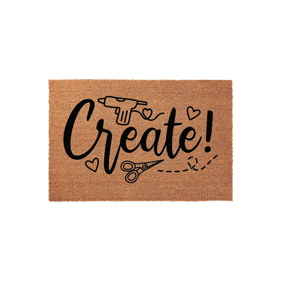 Create Craft Room Doormat featuring a natural coir texture with black printed text that reads Create! along with icons of a glue gun, scissors, and small hearts, making it a fun decor piece for any artist or crafter workspace