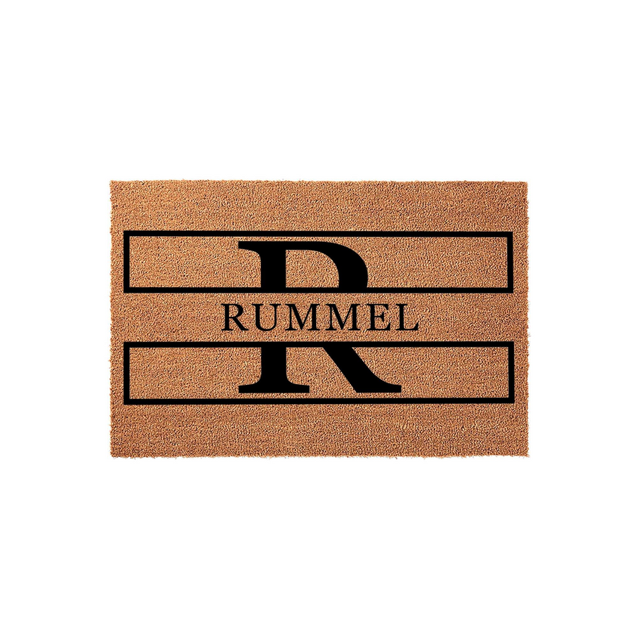Personalized family name coir doormat featuring a large black initial letter R centered behind the text, set against a natural brown coconut fiber background for a classic and durable entryway decor piece for any modern home.
