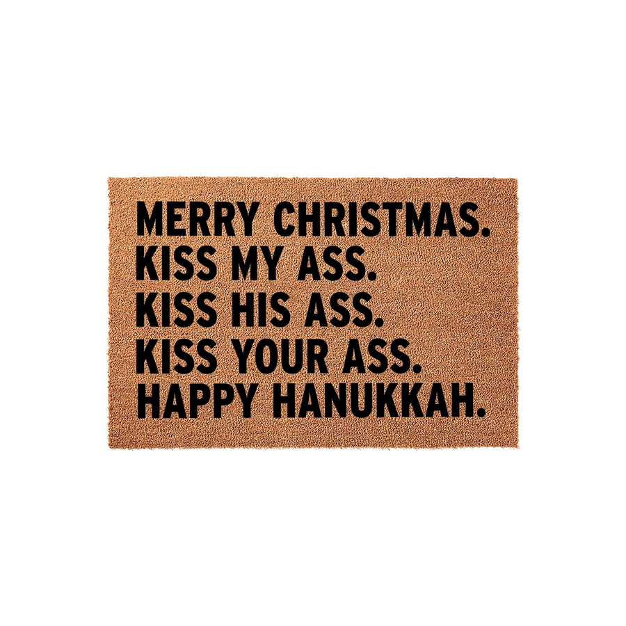 Funny Christmas and Hanukkah doormat made of natural coir fiber, featuring bold black text that reads Merry Christmas, Kiss My Ass, Kiss His Ass, Kiss Your Ass, Happy Hanukkah, set against a plain white background for a festive