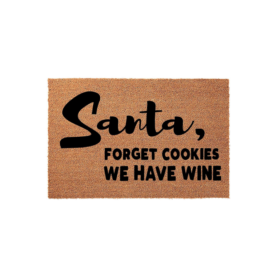 Funny Christmas doormat featuring natural coir fibers and bold black text that reads Santa, forget cookies we have wine, making it a humorous holiday home decor piece for your front porch entrance during the festive winter season.