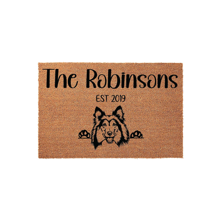 Personalized Collie dog doormat featuring a natural coir texture with a black printed illustration of a smiling Collie peeking over the bottom edge, customized with a family name and established year on a clean white background.