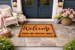 Funny Welcome Pero No Mucho Rato doormat featuring a natural coir fiber texture with black text, displayed on a stone porch in a cozy outdoor entryway setting, perfect for a humorous home decor entrance mat or front door welcome