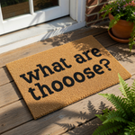 Funny doormat with the text what are thooose printed in bold black letters on a natural coir fiber welcome mat, perfect for a humorous front porch entry or a unique housewarming decor piece for your home entrance and entryway