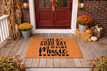 Music lover welcome doormat featuring the phrase It's A Good Day To Make Music on a natural coir fiber mat, displayed on a rustic fall porch with pumpkins and autumn decor for a stylish outdoor entrance and home entryway floor