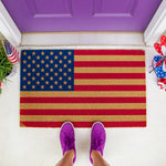 American flag doormat featuring a patriotic star and stripe design on natural coir fiber, perfect for a front porch welcome mat or outdoor entryway decor to celebrate national holidays with a classic red, white, and blue look.