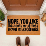 Funny zoo themed doormat for front porch entry, featuring bold black text on a natural coir welcome mat that reads Hope You Like Animals and Kids Because It Is A Zoo Inside, perfect for a busy family home with pets and children.