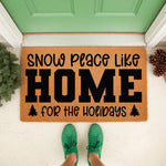 Holiday coir doormat with Snow Peace Like Home text and pine tree icons, featuring a natural fiber welcome mat for front porch decor, winter seasonal entryway rug, and festive Christmas home floor mat for a cozy seasonal look.