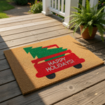 a door mat with a christmas tree on it