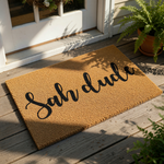 Sah dude coir doormat with black script lettering on a natural fiber welcome mat, perfect for a funny front porch entry, apartment decor, or housewarming entrance rug that adds a casual, humorous touch to your home doorway.